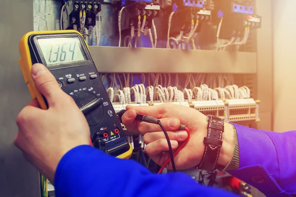 Electrician testing a consumer unit